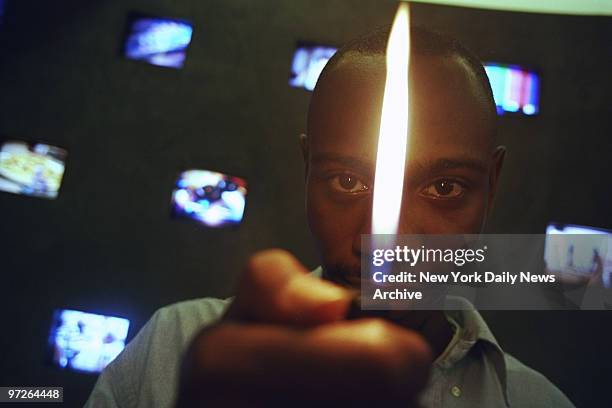 Comedian Dave Chappelle enjoys a light moment at the HBO offices on Sixth Ave.