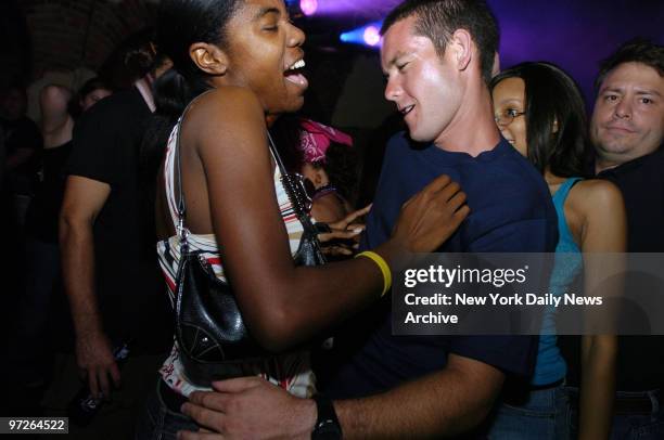 Clubgoers enjoy themselves at the recently-reopened Razzoo Club and Patio, which features live bands, on Bourbon St. In the famed French Quarter of...