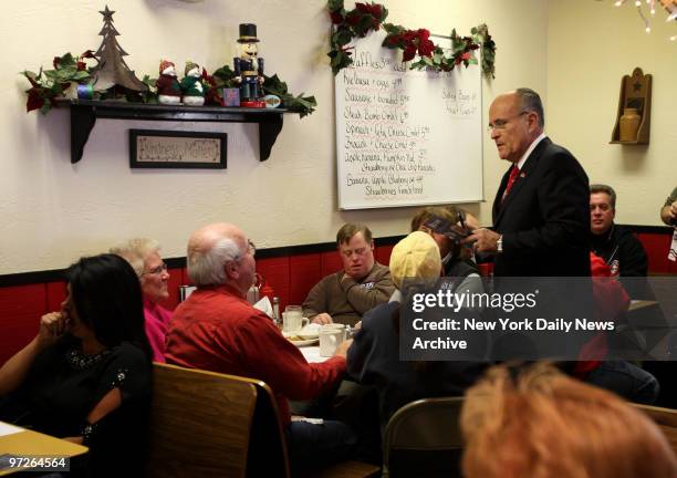 Rudy talks with locals at Suzie's Diner in Hudson., Rudy Giuliani bus tour of New Hampshire., Suzie's Diner in Hudson, NH.