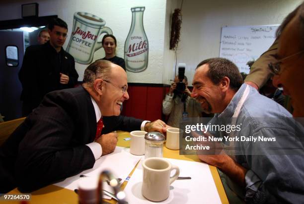 Rudy talks with Suzie's Diner owner Al Semple in Hudson., Rudy Giuliani bus tour of New Hampshire., Suzie's Diner in Hudson, NH.