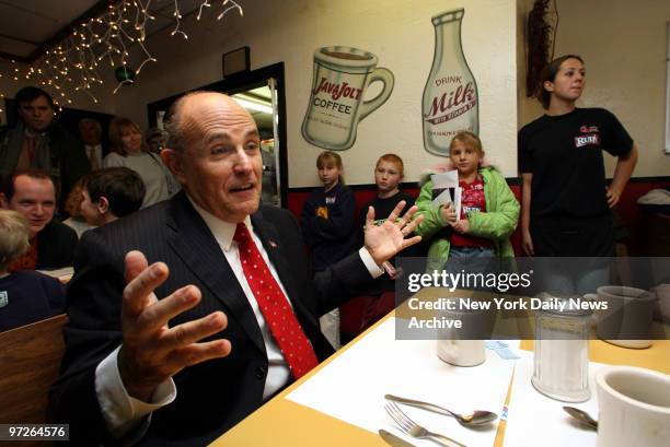 Rudy talks with Suzie's Diner owner Al Semple in Hudson., Rudy Giuliani bus tour of New Hampshire., Suzie's Diner in Hudson, NH.