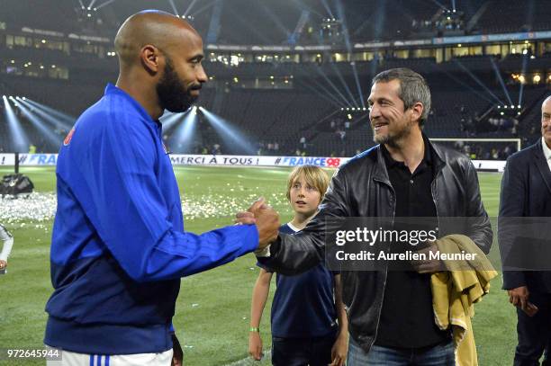 Thierry Henry of France 98 and Guillaume Canet of react after the friendly match between France 98 and FIFA 98 at U Arena on June 12, 2018 in...