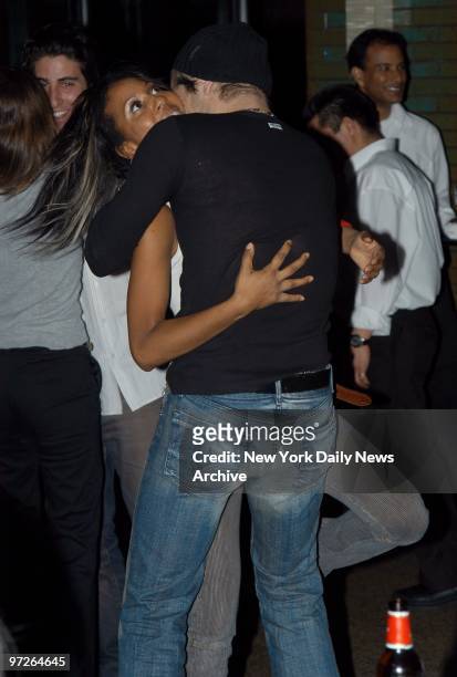 In the clutch, it's dancing cheek-to-cheek - and then some - for Colin Farrell and his partner, Sade, during a post-screening party at Park for his...