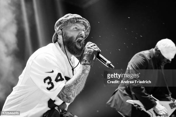 Fred Durst and Wes Borland of Limp Bizkit perform live on stage during a concert at Max Schmeling Halle Berlin on June 12, 2018 in Berlin, Germany.