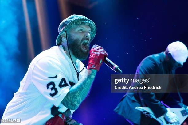 Fred Durst and Wes Borland of Limp Bizkit perform live on stage during a concert at Max Schmeling Halle Berlin on June 12, 2018 in Berlin, Germany.