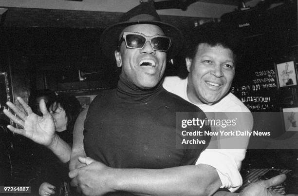 Bobby Womack and Chubby Checker at a party.