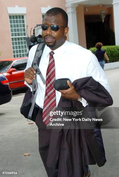 Lawyer Wayne Monroe who represents Howard K. Stern walks outside the courthouse before the start of the custody hearing for the late Anna Nicole...