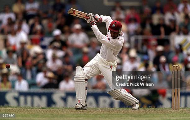 West Indies captain Jimmy Adams drives during his innings of 59 not out against the Prime Ministers X1 during the one day cricket game between the...