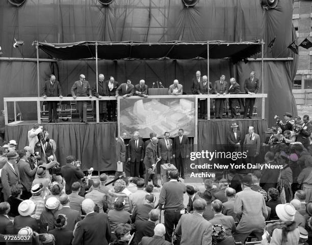 Ina gesture belieing the physical setbacks he's suffered since being in the White House, President Eisenhower hoist heaping shovelful of earth as he...