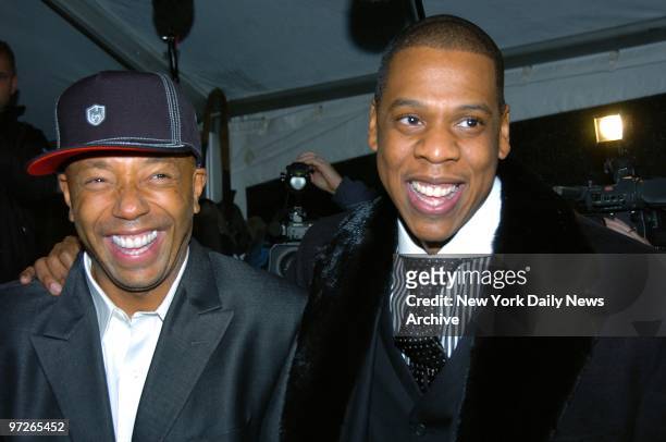 Russell Simmons and Jay-Z arrive at the Ziegfeld Theatre on W. 54th St. For the world premiere of the documentary film "Fade to Black." The movie...