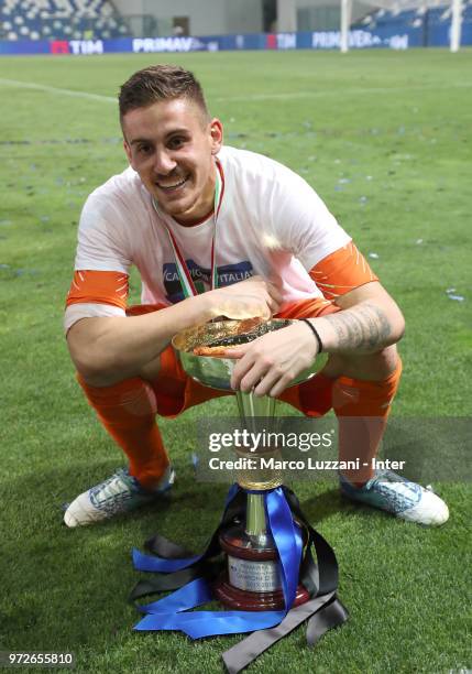 Marco Pissardo of FC Internazionale shows the trophy after winning the Serie A Primavera Playoff Final match between FC Internazionale U19 and ACF...