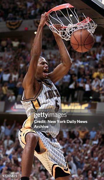 Indiana Pacers' Jalen Rose dunks the ball with 2.4 seconds left in the game to wrap up an 88-84 win over the New York Knicks at Conseco Fieldhouse....