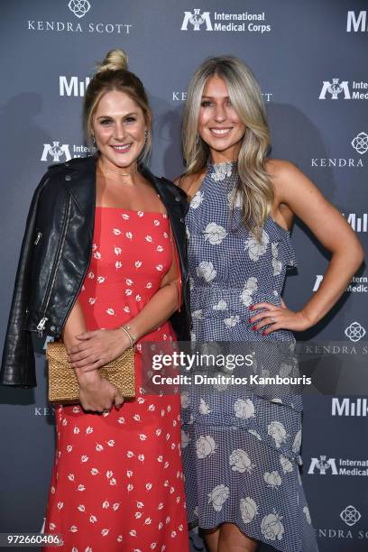 Amy Young and Becky Hintz attend the International Medical Corps summer cocktail event hosted by Sienna Miller and Milk Studios at Milk Studios on...