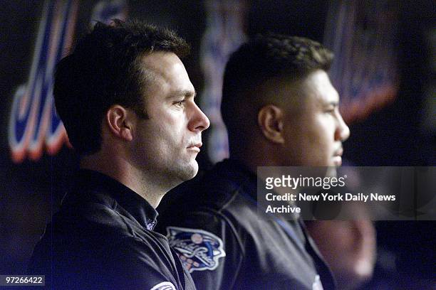 New York Mets' Todd Zeile and Benny Agbayani sit dejected in the dugout in the bottom of the 9th inning of Game 4 of the World Series against the New...