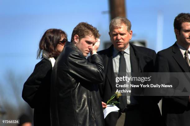 Ryan Kocher, the ex-boyfriend of Imette St. Guillen, wipes away tears after attending a funeral service for the slain 24-year-old graduate student at...