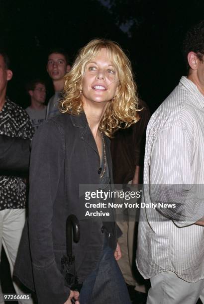 Brolly in hand, Meg Ryan arrives for the opening night of Chekhov's "The Seagull" at the Delacorte Theater in Central Park. Rain interrupted, then...