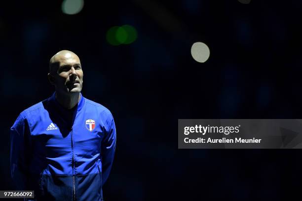 Zinedine Zidane of France 98 reacts during the players presentation before the friendly match between France 98 and FIFA 98 at U Arena on June 12,...