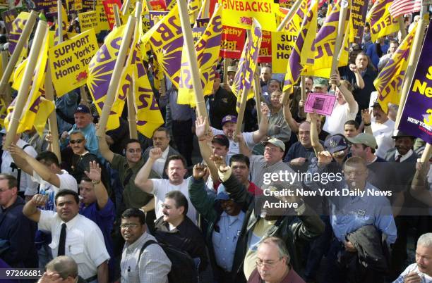 Fifth Ave. Is filled with doormen, porters and superintendents marching in a prelude to a threatened strike Monday against 3,000 apartment buildings....