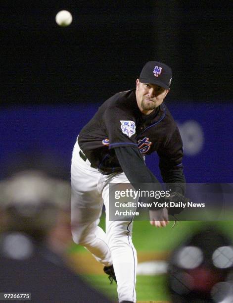 New York Mets' starter Bobby J. Jones hurls one toward the plate during Game 4 of the World Series against the New York Yankees. The Yankees held on...