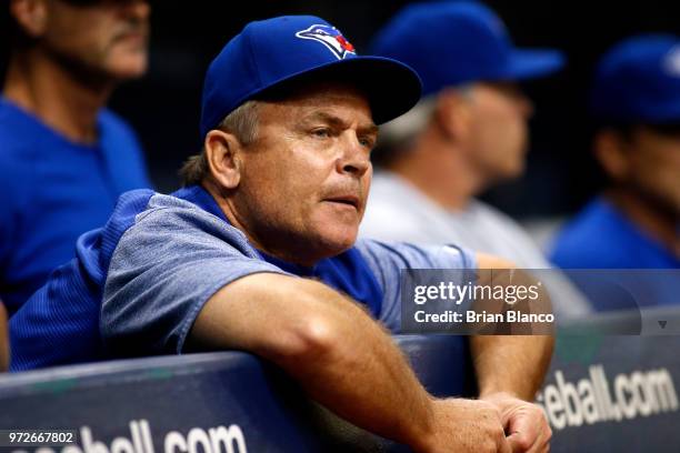 Manager John Gibbons of the Toronto Blue Jays whistles from the dugout during the second inning of a game against the Tampa Bay Rays on June 12, 2018...