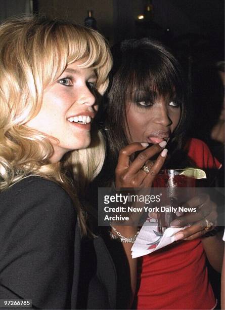 Models Claudia Schiffer and Naomi Campbell get together at the Fashion Cafe. They're both investors in the cafe.