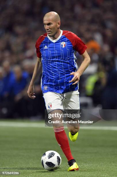 Zinedine Zidane of France 98 runs with ball during the friendly match between France 98 and FIFA 98 at U Arena on June 12, 2018 in Nanterre, France.