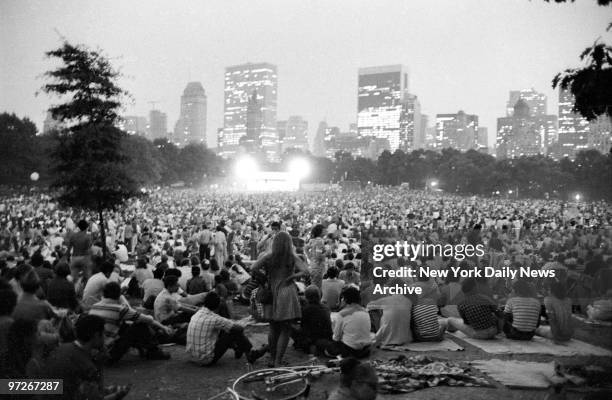 Leonard Bernstein Conducts the New York Philharmonic in a free concert in the Sheep Meadow, Central Park.