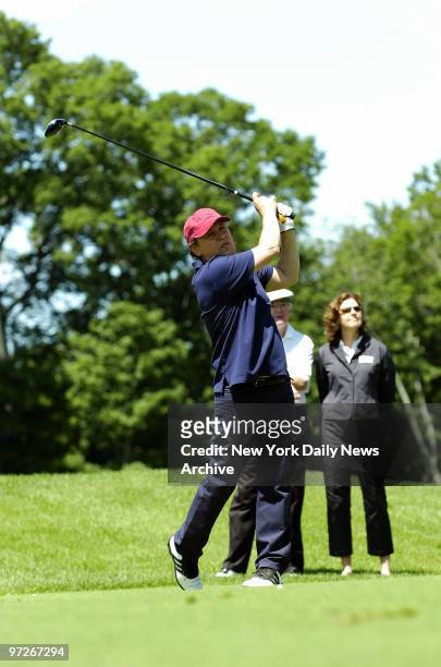 Comedian Billy Crystal tees off during the Third Annual Golf Classic for The Joe Torre Safe at Home Foundation at Trump National Golf Course in...