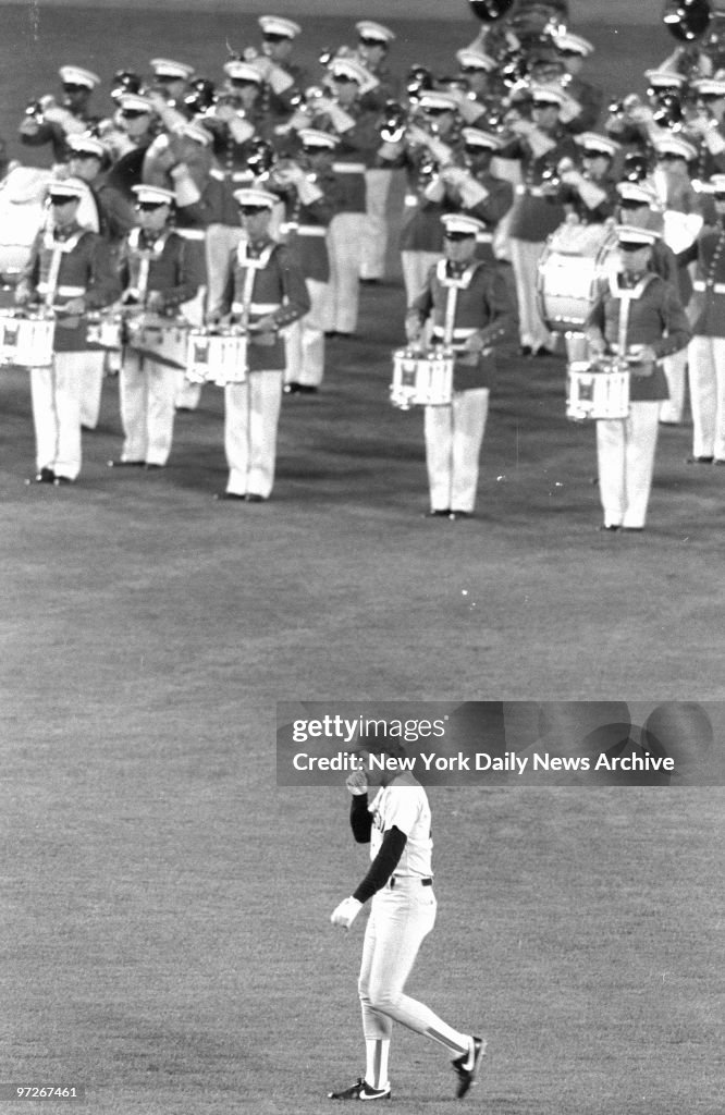 Boston Red Sox' Wade Boggs blows on hands at chilly Shea Sta