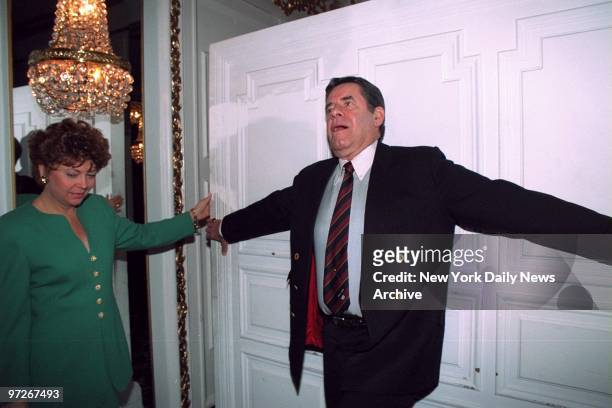 Comedian Jerry Lewis clowns as his wife, Sam, looks on during the Drama League annual awards at the Plaza Hotel. ,