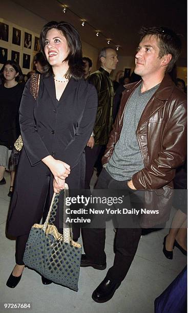 Monica Lewinsky attends the Timothy Greenfield-Sanders portrait photo exhibit at Mary Boone Gallery with friend Greg Henderson.