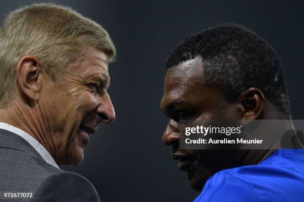 Arsene Wenger of FIFA 98 and Marcel Desailly of France 98 speak during the players presentation before the friendly match between France 98 and FIFA...