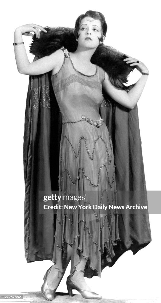 Film star Clara Bow models for the camera.