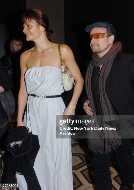 Bono arrives with friend Helena Christensen at the Tribeca Grand Hotel screening room for the Cinema Society's screening of the movie "Zodiac."