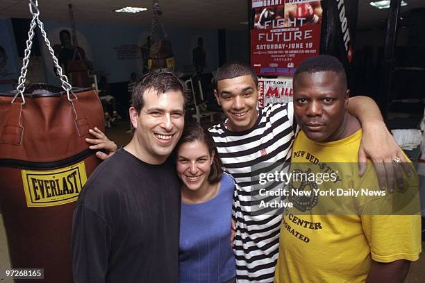 Filmmakers Brett Morgen and Nanette Burstein get together with boxer Noel Santiago and trainer Harry Keitt at the Bedford-Stuyvesant Boxing Gym where...