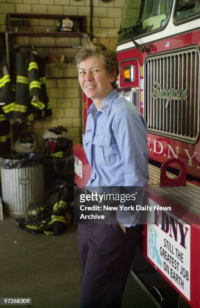 Fire Department Lt. Brenda Berkman of Ladder 12 leans up against a truck on her last day at the station house on W. 19th St. Her upcoming promotion...