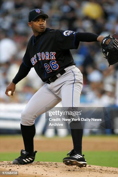 New York Mets' starter Orlando Hernandez winds up for a pitch against the New York Yankees during Game 1 of a three-game Subway Series at Yankee...