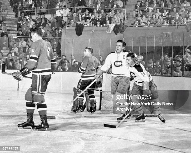 Montreal Canadiens' Maurice Richard and kid brother Henri embrace after they teamed together to score against the New York Rangers at Madison Square...
