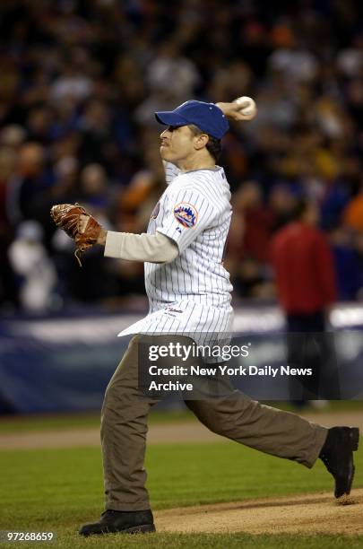 Comedian Jon Stewart throws out the ceremonial first pitch before Game 2 of the National League Championship Series between the New York Mets and the...