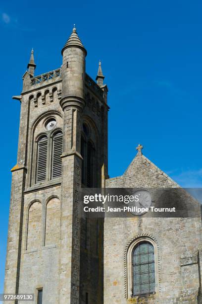 unusual bell tower of a romanesque church in a rural part of france, église saint-gervais-et-saint-protais, le montet, france - église stock-fotos und bilder