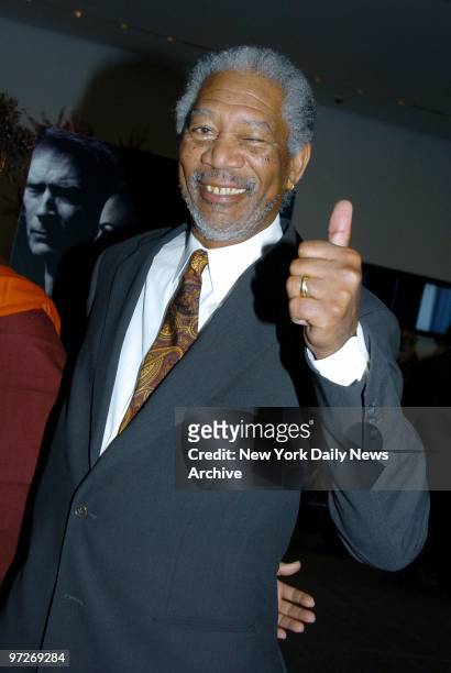 Morgan Freeman gives a thumbs-up to the premiere of the movie "Million Dollar Baby" at the Museum of Modern Art. He stars in the film.