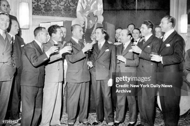 More than 200 movie stars, directors and producers gathered at the Hotel Astor to attend a bachelor dinner for producer Mervyn LeRoy. Drinking a...