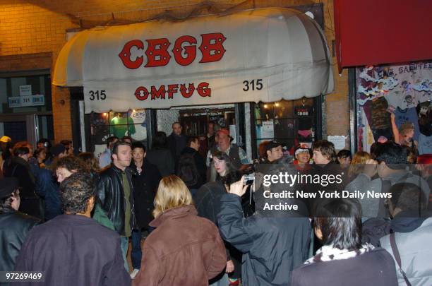 Crowds gather outside legendary rock club CBGB on the Bowery. The birthplace of punk held its last performance tonight, closing after over 30 years...