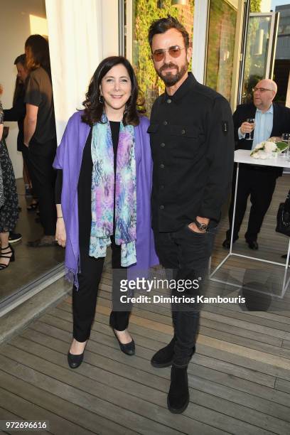 President & CEO, International Medical Corps Nancy Aossey and Justin Theroux attend the International Medical Corps summer cocktail event hosted by...