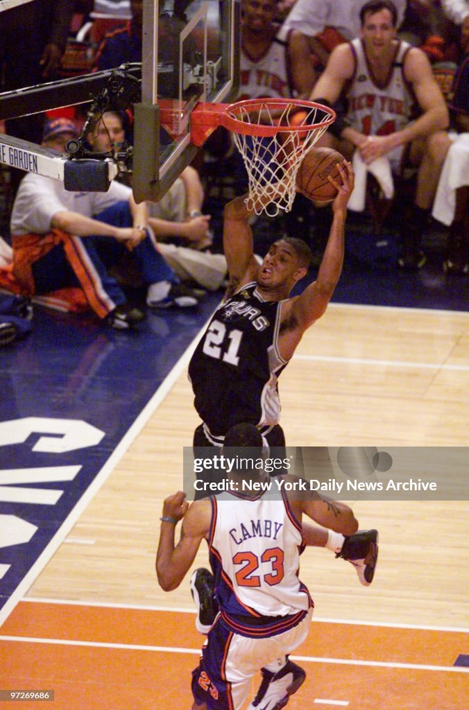 San Antonio Spurs Tim Duncan (21) has the ball as New York K