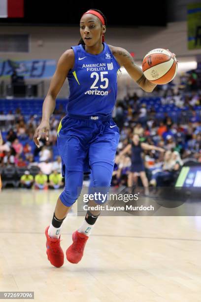 Glory Johnson of the Dallas Wings handles the ball against the Phoenix Mercury on June 12, 2018 at the College Park Center in Arlington, Texas. NOTE...