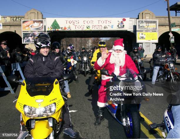 Santa, who seems to have left Dancer, Prancer and Rudolph home to rest up for Christmas Eve, joins motorcyclists at Hillside and Myrtle Aves.,...