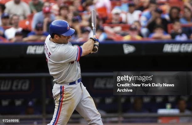 Montreal Expos' Todd Zeile, formerly of the New York Yankees, hits a solo home run to left center field in the 10th and last inning of game against...