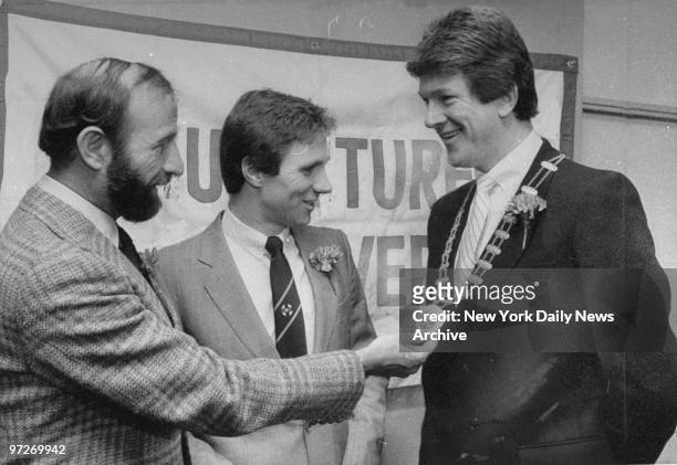 Ireland track runner Eamonn Coghlan with Fred Lebow and Paudie O'Connor.