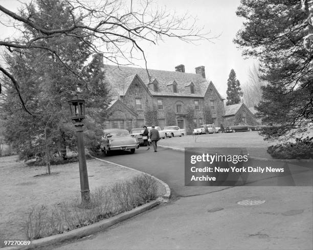 The body of Abner "Longie" Zwillman is removed from his palatial, 20-room English type masion in West Orange, N.J., where he was found by his wife...